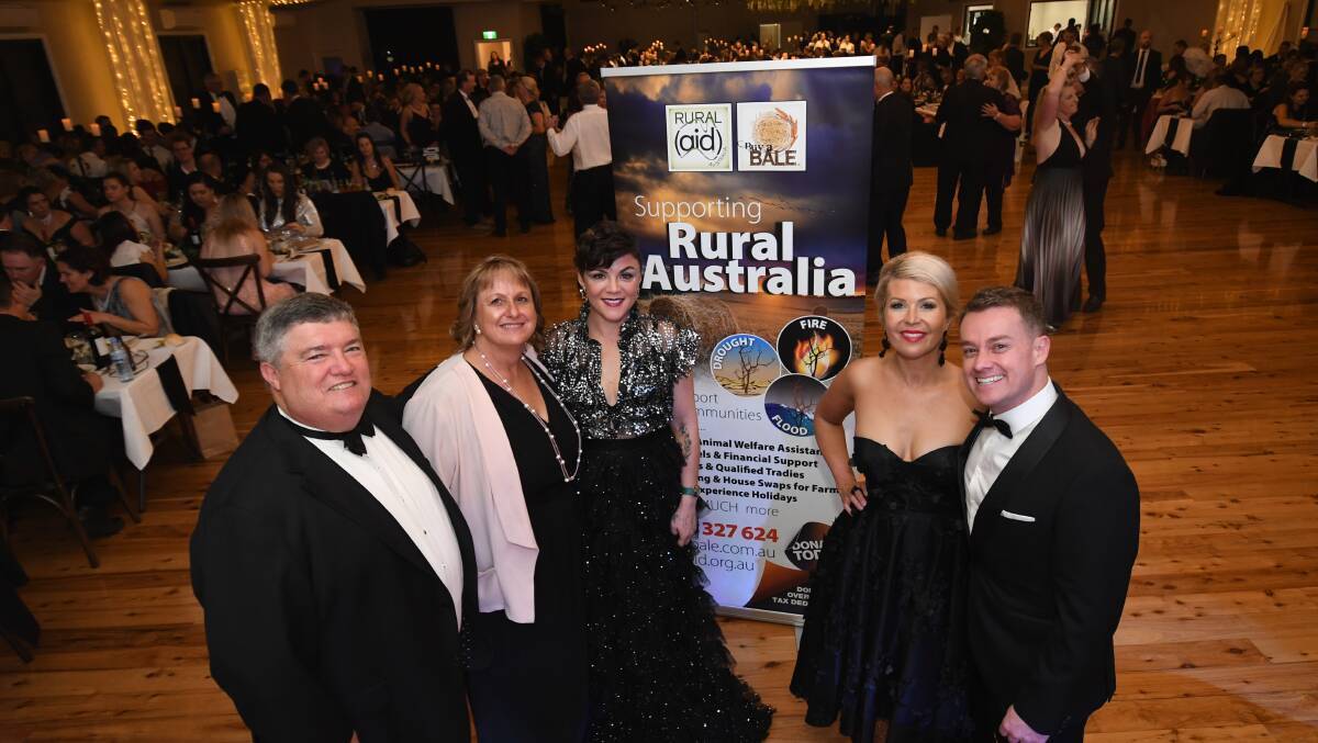 PAST SUCCESS: Rural Aid founders Charles and Tracy Alder with Em Rusciano, Chezzi and Grant Denyer at last year's Black Tie and Boots Ball. This year's event has been cancelled. Photo: CHRIS SEABROOK