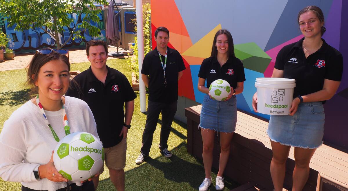 SUCCESS: headspace Bathurst youth care coordinator Jess Hopwood [left] and community engagement officer Jake Byrne [middle] with CSU FC club captain Brady Evans, vice president Emily Thurlow and events coordinator Sophie Tarrant-Foder. Photo: SAM BOLT