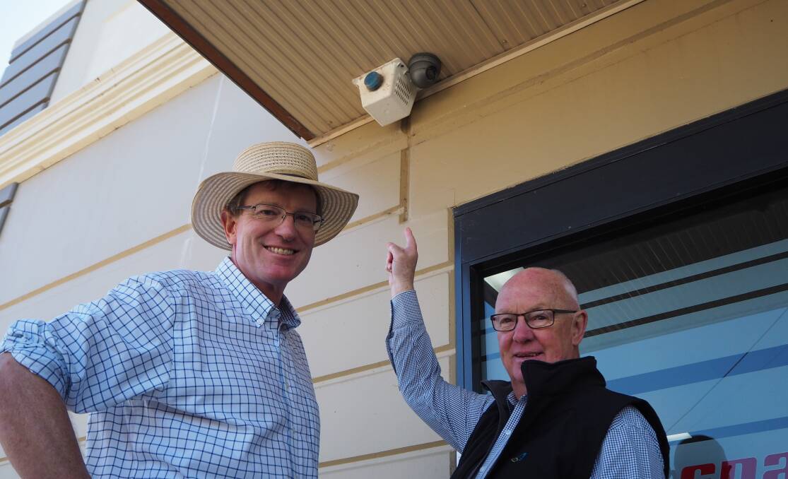 SMILE FOR THE CAMERA: Federal member for Calare Andrew Gee and Bathurst mayor Graeme Hanger have welcomed funding for more closed-circuit television [CCTV] cameras in the CBD. Photo: SAM BOLT 042919sbcctv1