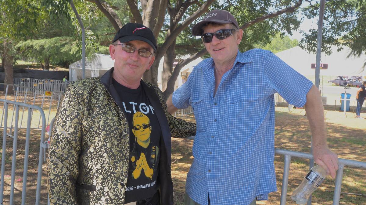 QUEUED UP: Bathurst's Bruce Wilson and Orange's Rob Moffitt were among the first in line for Sir Elton John's concert last night. Photo: SAM BOLT