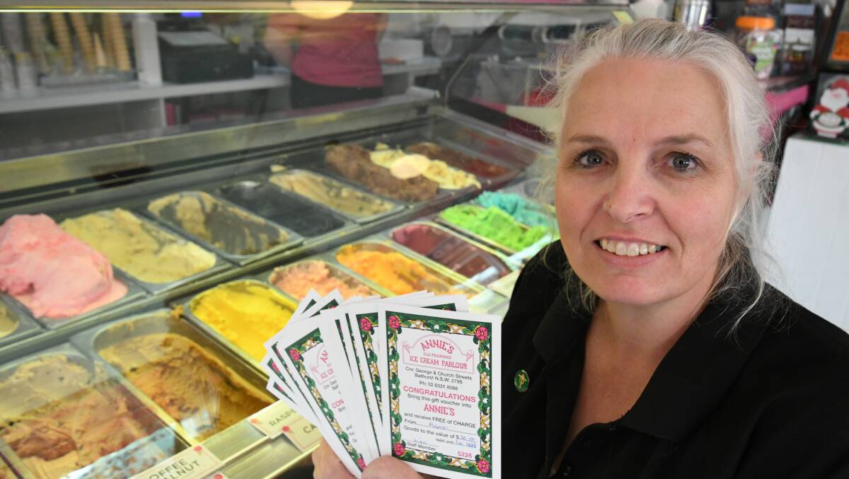 NOMINATE A BATTLER: Lisa Pitts from Annie's Ice Cream Parlour with the farmers' vouchers. Photo: CHRIS SEABROOK 12119cannies