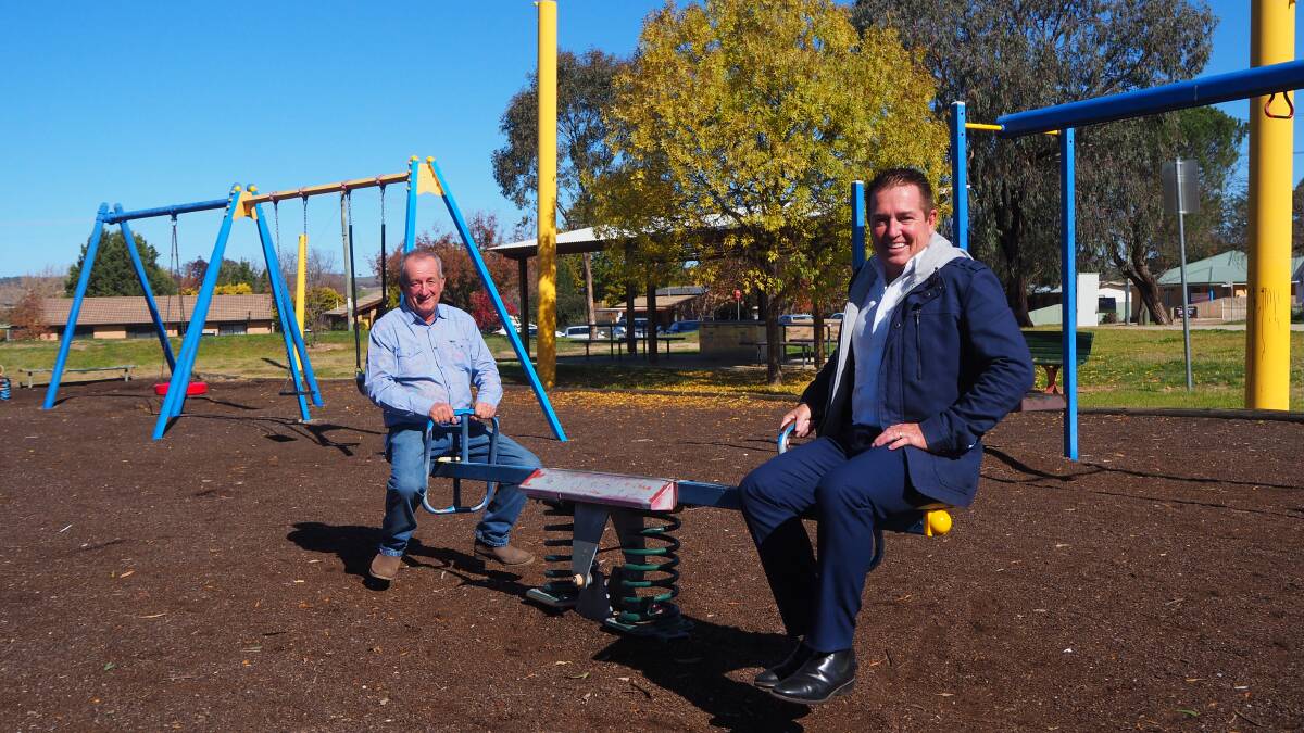 SEE-SAW: Mayor Bobby Bourke and Bathurst MP Paul Toole at the Eglinton Oval's playground, which is set for a $272,000 upgrade. Photo: SAM BOLT