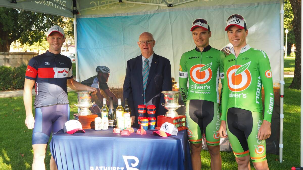 RIDE ON: Champion Bathurst cyclist Mark Renshaw and councillor Graeme Hanger with local competitors Tom Bolton and Will Hodges. Photo: SAM BOLT