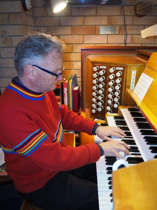 KEYED IN: All Saints' Cathedral director of music David Hood providing a demonstration on the pipe organ. Photo: SAM BOLT 052919sbdavi2
