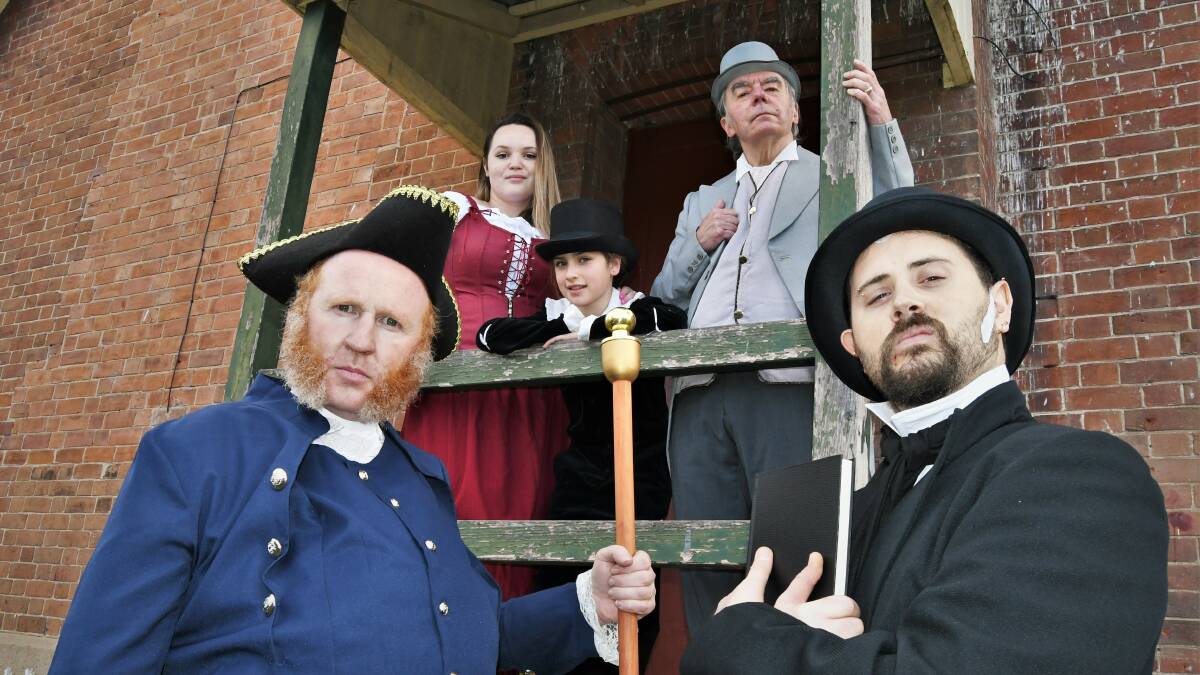 Patrick Sinclair (Mr. Bumble), Emily Hayes (Nancy), Emma Lindsay (Oliver), Phil Sanders (Mr. Brownlow) and Alex Woodhouse (Mr. Sowerberry) promoting Carillon Theatrical Society's production of Oliver. Picture: Chris Seabrook