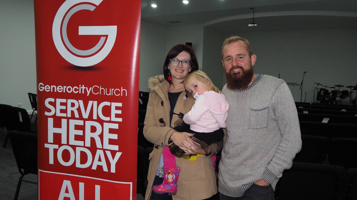 MODERN FAITH: Generocity Church pastors Renee and Caleb Dwyer [with daughter Matilda] will be opening their new venue this Sunday.