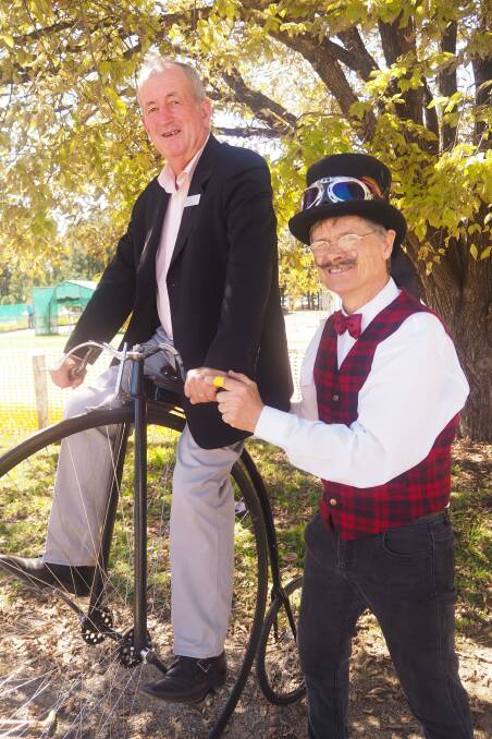 PENNY FARTHING: Bathurst mayor Bobby Bourke with local bicycle enthusiast John Kitchen. Photo: SAM BOLT