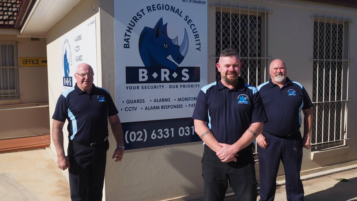 CHARGING AHEAD: Bathurst Regional Security sales manager Ken Mitchell, general manager Wayne Cohen and managing director Hywel Blake.
