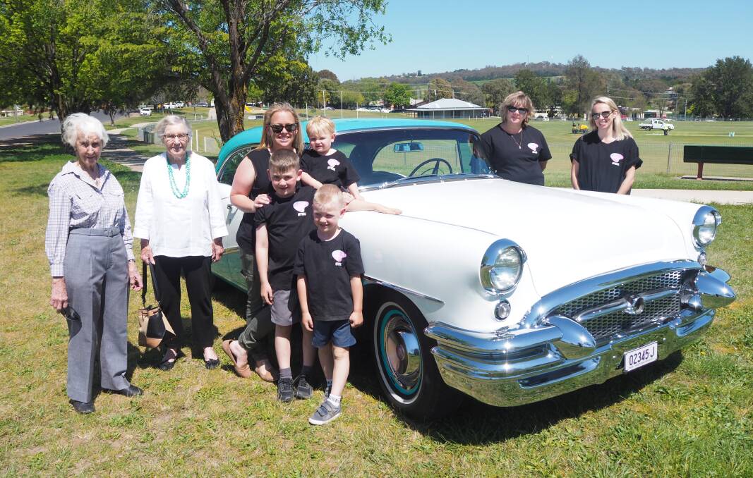 SUCCESS: Can Assist's Gen Croaker and Barbara Piddington with Cruise & Shine organiser Mel James, Hudson, Charlie and Ollie Moore, Michele and Karen James.