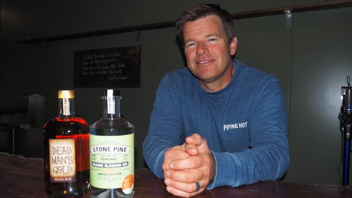 FINE DROPS: Stone Pine Distillery's Ian Glen with his new Dead Man's Gold spiced rum and Orange Blossom Gin varieties. Photo: SAM BOLT