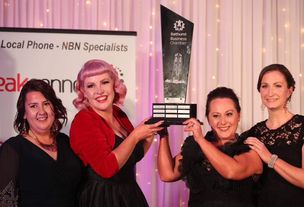 PAST WINNERS: Anna Smith and Vanessa Pringle from Vanessa Pringle Floral Designs, holding the trophy for Carillon Business of the Year in 2019. Photo: PHIL BLATCH