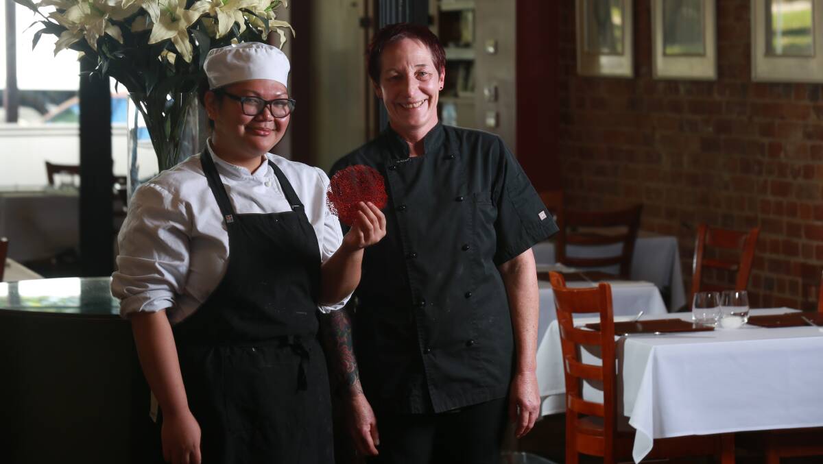 EXPERIMENTING WITH FOOD: Cobblestone Lane sous chef Elaine Mante and head chef Melissa Schembri with 'coral' garnish. Photo: PHIL BLATCH