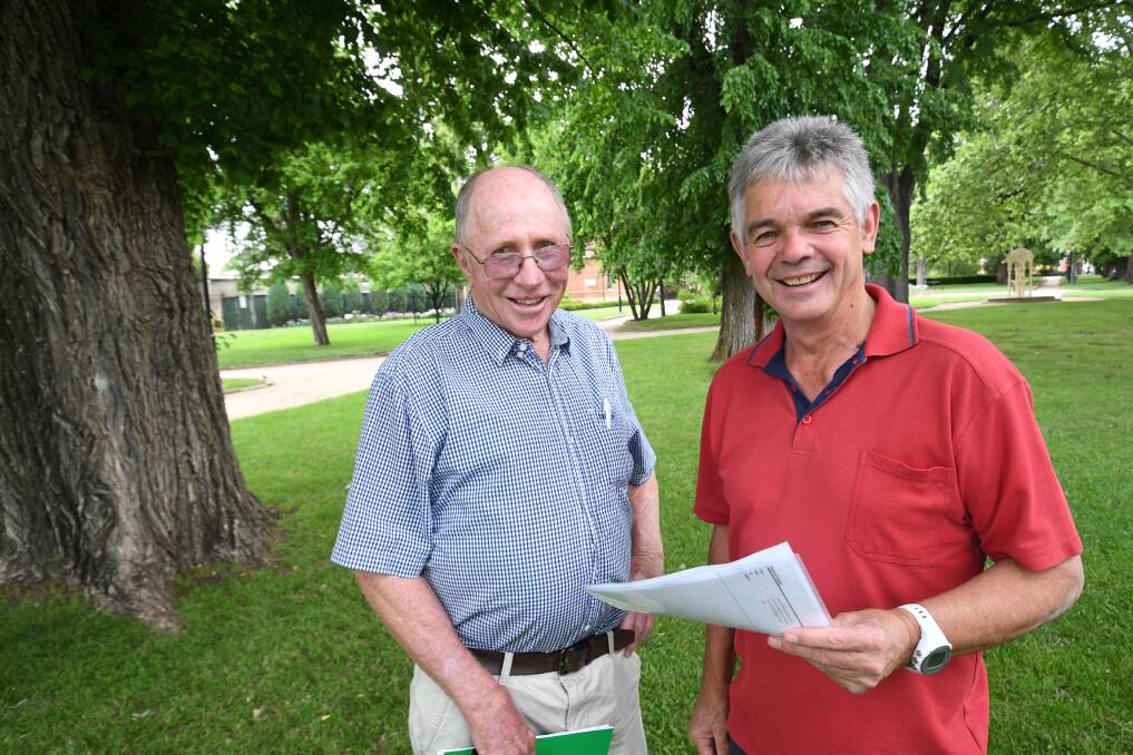 A PROPER REUNION: Leon Bennetts and Ray Stapley are calling for ex-Edgell employees to join them next Friday. Photo: CHRIS SEABROOK 