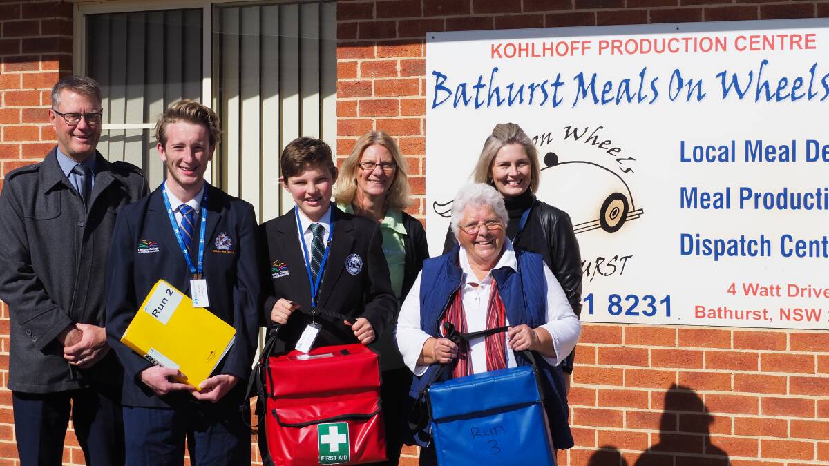 VOLUNTEERS: Denison College has partnered with Bathurst Meals on Wheels this week to help deliver food for the community's elderly and disabled population.