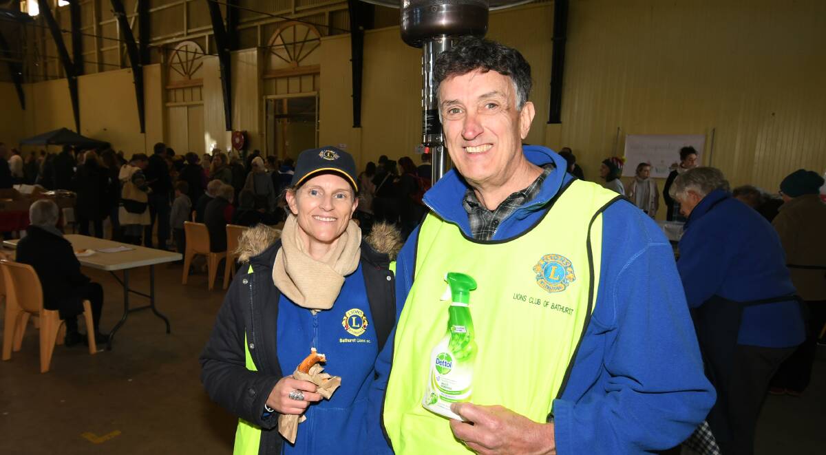BACK IN SEPTEMBER: Lions Club of Bathurst's Barb Hill and Mal Purves at June's Farmers' Market at the Bathurst Showground. Photo: CHRIS SEABROOK 062720cfmkts1