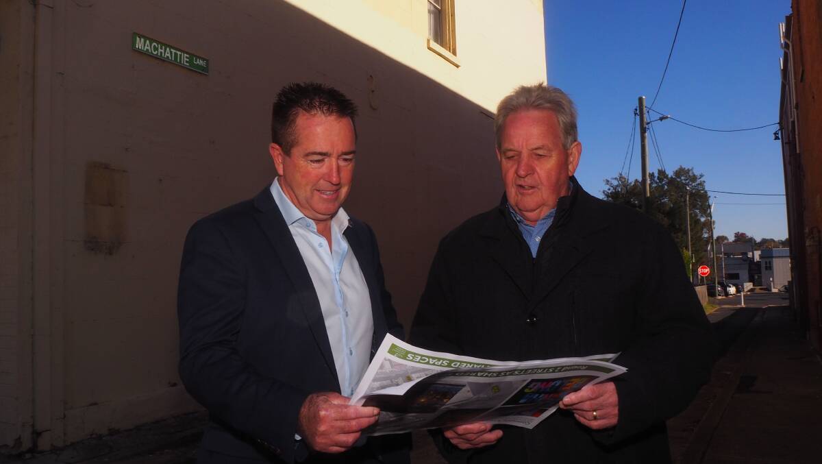 STREET PLANS: Deputy premier and Bathurst MP Paul Toole with Bathurst mayor Robert Taylor in Machattie Lane. Photo: SAM BOLT