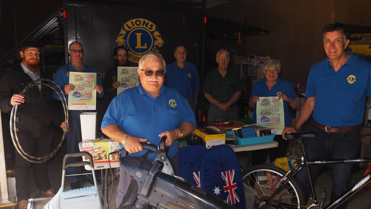 USED TREASURES: Members of the Bathurst Lions Club with a taste of what to expect at next weekend's Garage Sale Trail. Photo: SAM BOLT
