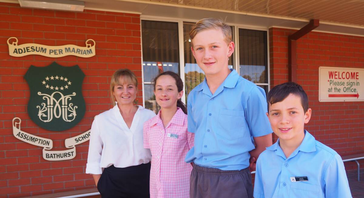NEW HEAD OF SCHOOL: Incoming Assumption School principal Kate Salmon with 2020 student leaders Lexie Reid, Jack Mulligan and Jacob Pezzuto. Photo: SAM BOLT
