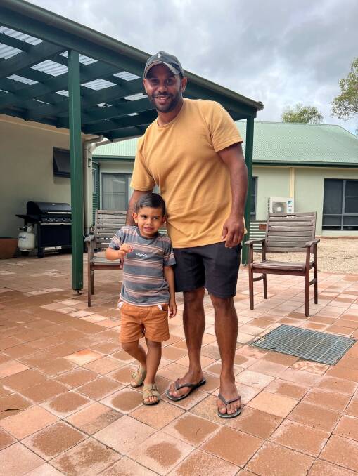 TOGETHERNESS: Bathurst's Jordan Boney with his son. Mr Boney delivered the Welcome to Country at last Friday's Harmony Week morning tea.