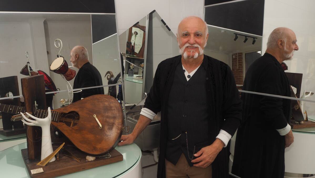 MIRROR IMAGE: Abstract Reflections curator and artist Giuseppe Giovenco inside his Tremain's Mill gallery space, which encompasses over 50 years worth of creativity. Photo: SAM BOLT