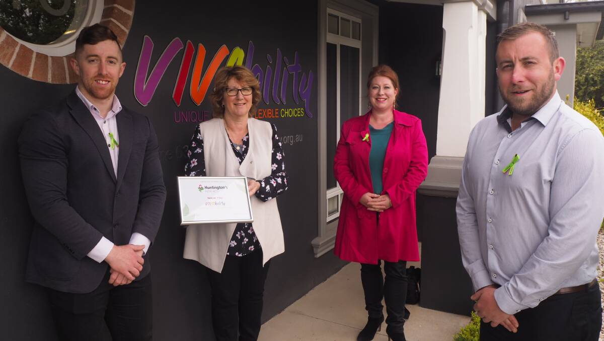 SUCCESS: Vivability's Blake Aubin [left] and Tom Fox [right] with Huntington's NSW ACT's Pauline Keyvar and HD Awareness Orange's Rachael Brooking. Photo: SAM BOLT