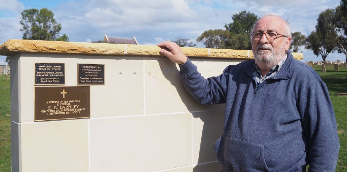 WORK ON THE WALL: Bathurst Family History Group secretary Graeme Hill says members have transitioned to online conferencing with ease. Photo: SAM BOLT
