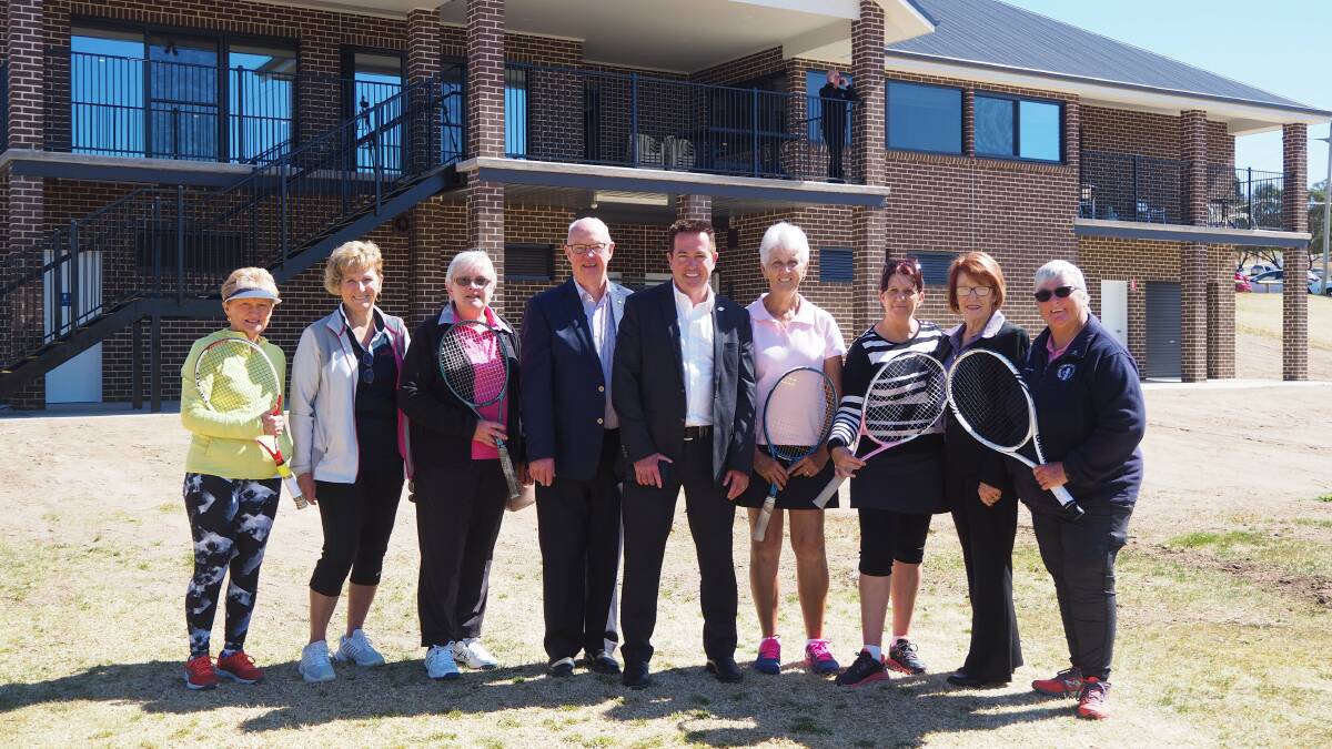 ANYONE FOR TENNIS: Mayor Graeme Hanger and Bathurst MP Paul Toole with members of the Bathurst Carillon City Tennis Club. Photo: SAM BOLT 091119sbtenn1