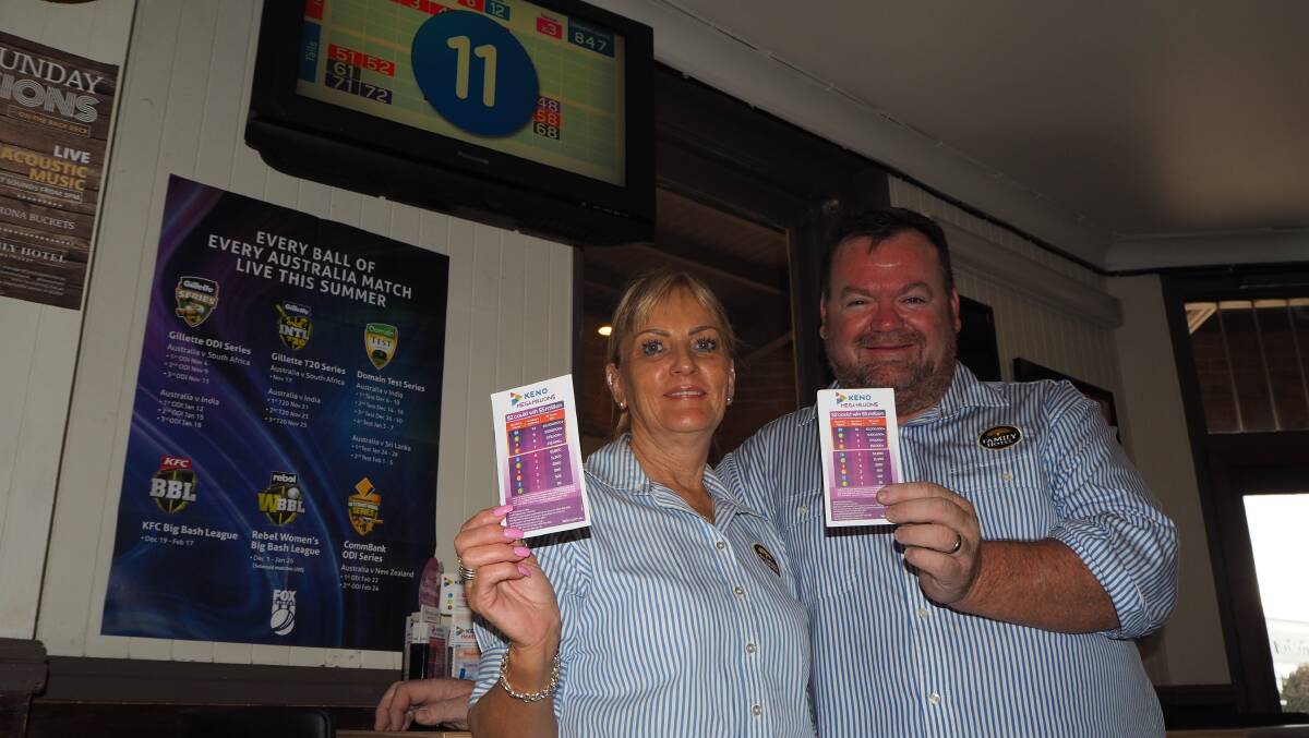 MAJOR PRIZE: The Family Hotel's Gloria Smith and Adrian Dews [manager] were thrilled to see one of their customers win big playing Keno at their venue over the weekend. Photo: SAM BOLT 010819sbkeno1