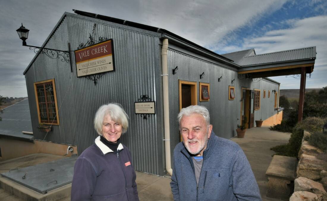 PASSING THE KEYS: Liz Mc Farland and Tony Hatch are set to move on from Vale Creek Wines after nearly two decades promoting Italian-style winemaking in the Bathurst community. Photo: CHRIS SEABROOK
