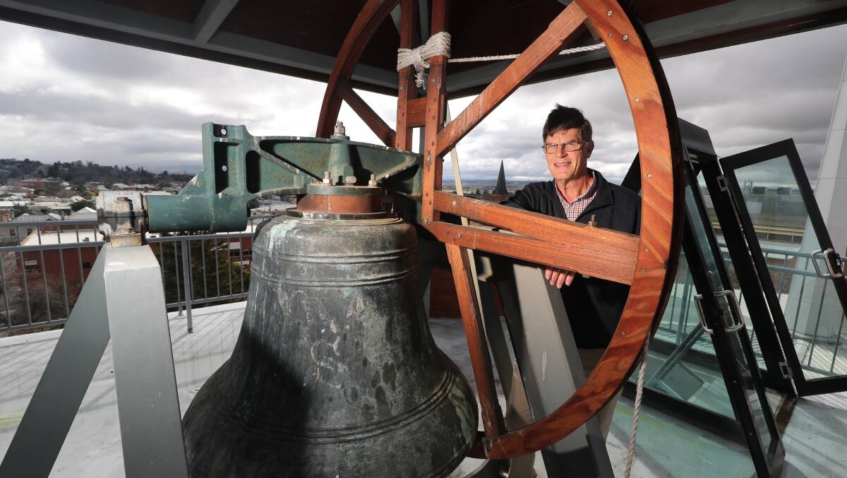 FOR WHOM THE BELL TOLLS: All Saints Cathedral bell ringer Simon Coomans atop the venue's tower. Photo: PHIL BLATCH 070819pbbell3