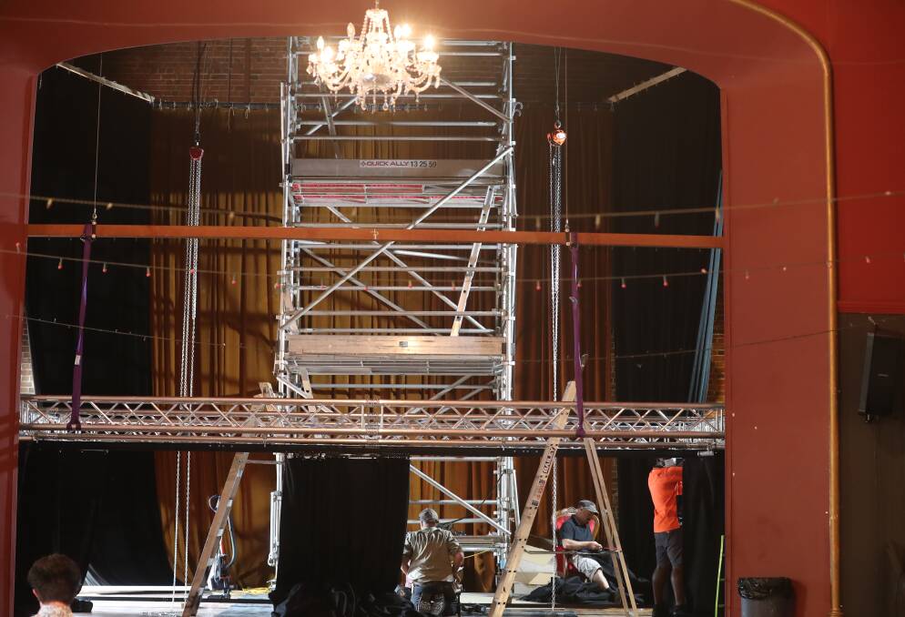 BRAND NEW RIG: Workers install a new lighting rig for the main stage at Keystone 1889 on Monday. Photo: PHIL BLATCH