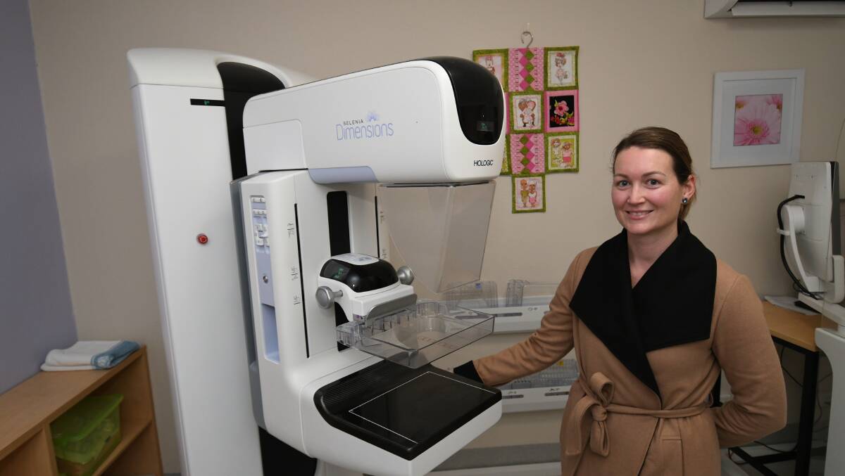 TAKE A FRIEND: BreastScreen NSW health promotions officer Kay Smith with a breast screening unit at the Bathurst centre. Photo: CHRIS SEABROOK 081319chekem1