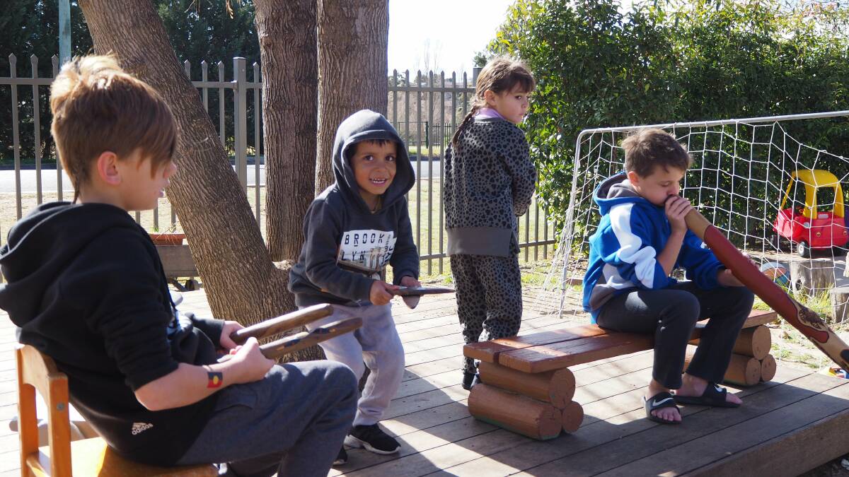 MUSIC AND DANCE: Towri MACS Centre children take part in a musical performance. Photo: SAM BOLT