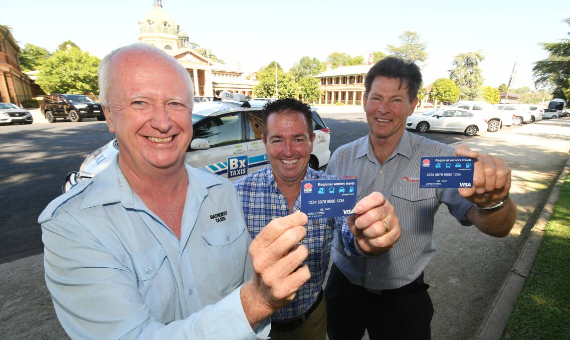 TICKET TO RIDE: Bathurst Taxis' Paul Shanahan, state member for Bathurst Paul Toole and NSW TrainLink's Phil Baker the new Regional Seniors Travel Cards. Photo: CHRIS SEABROOK 012920csentcard