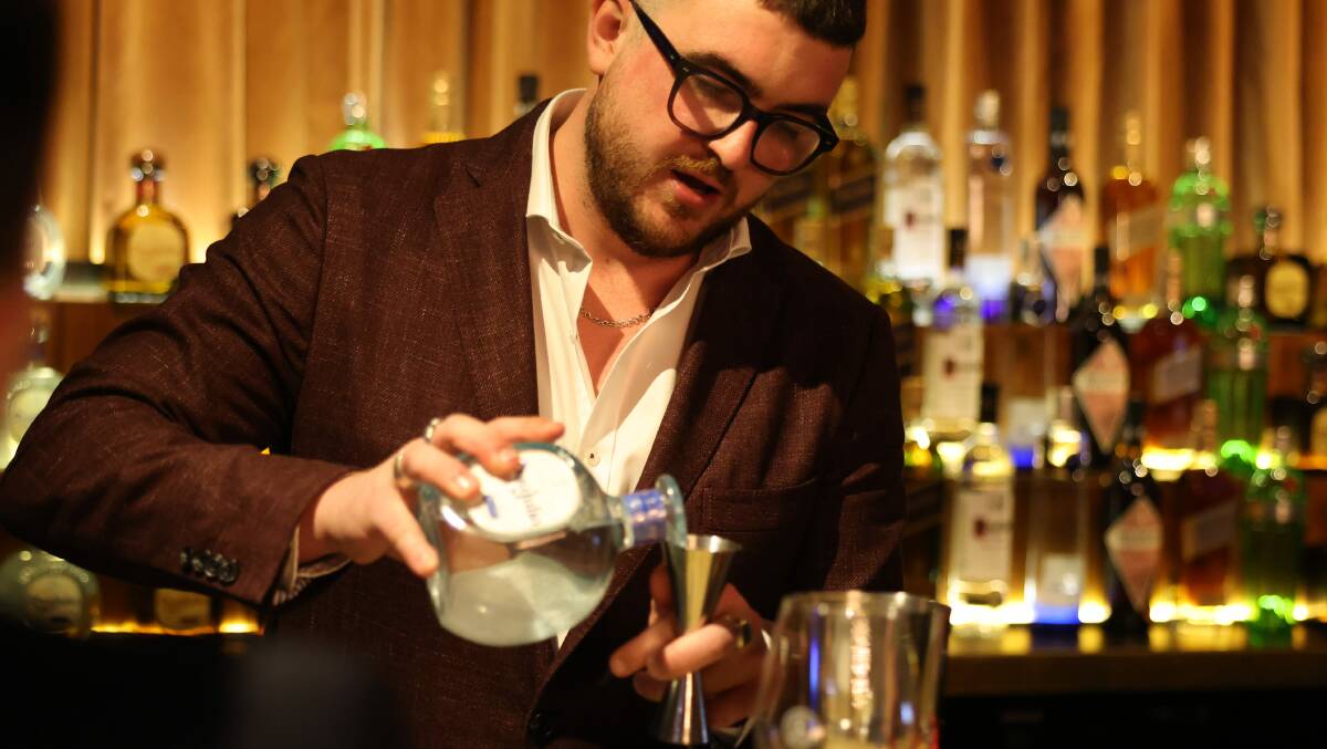 CONCOCTION: Evan Stroeve competing in the Australian World Class Bartender of the Year final. Photo: SUPPLIED