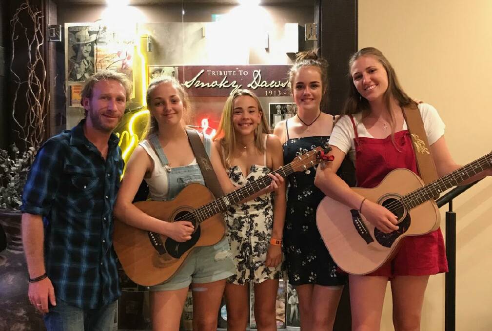 GAINING EXPERIENCE: Bathurst Academy of Music manager Mickey Pye with Tameka Kennedy, Isabelle Renshaw, Belle Whitwell and Ash Sproule. Photo: SUPPLIED