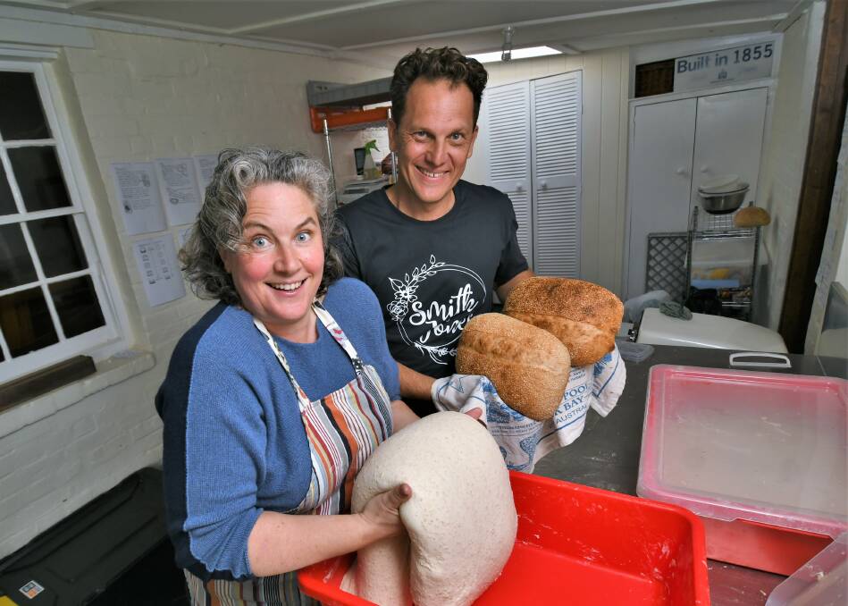 FROM DOUGH TO WHOA: The Itinerant Baker's Fiona Green with Australian Milling Museum chief executive officer Jess Jennings showcasing milled sourdough. Photo: CHRIS SEABROOK 060121cdough