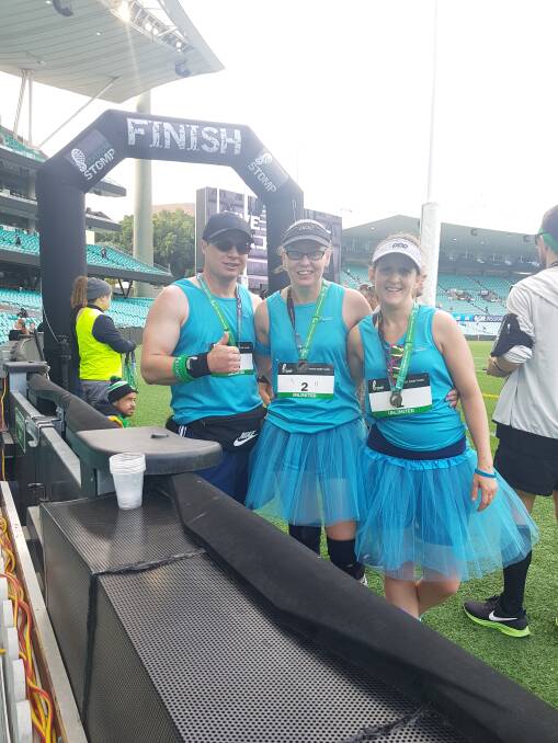 COMPLETE: Julian O'Brien, Jess Hammond and Natalie Newman at the finsh line of the Sydney Cricket Ground Stadium Stomp. Photo: SUPPLIED
