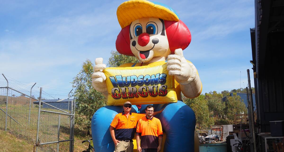 FUNNY: The Junktion's Justin Fowler and Timothy Lawrence with the blow-up Hudsons Circus clown recently dropped off at the centre. Photo: SAM BOLT