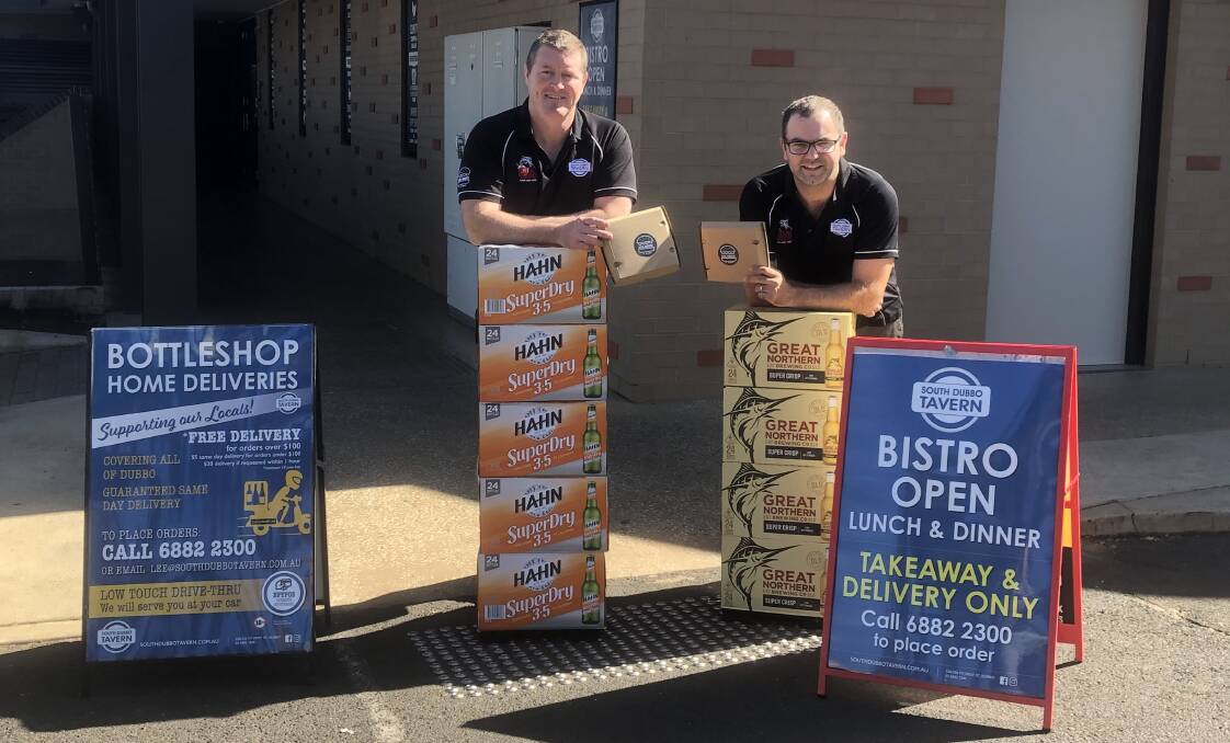 THANK YOU: South Dubbo Tavern owners Lee Green and Matt Rauchle say they are "making ends meet" thanks to tremendous support from the community. Photo: DANIEL SHIRKIE