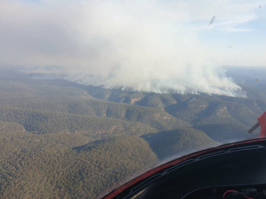 FROM ABOVE: Residents living in Mellong, St Albans and Upper MacDonald who plan to leave in the case of a bushfire should do so now, the NSW RFS warns. Photo: NSW RFS