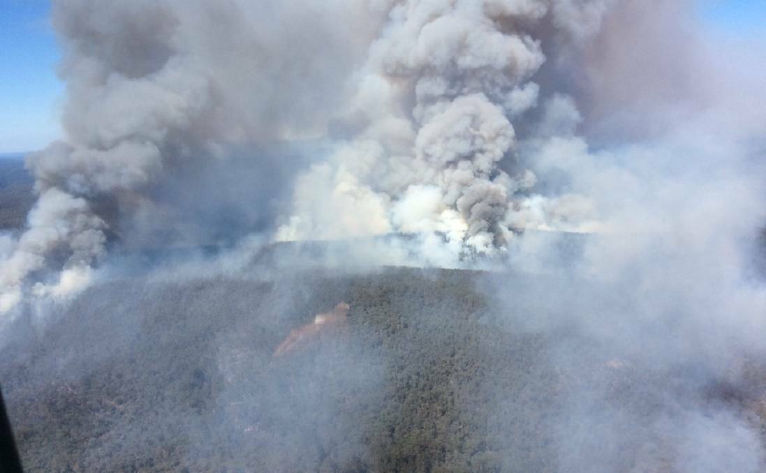 BLAZE: A bushfire burning through the Wollemi National Park is burning at emergency alert level late Tuesday. Photo: NSW RFS