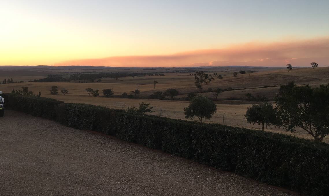 SNAPSHOT: A number of bushfires in the region created a beautiful smoky sunset on Sunday. Photo: LYNDA IRELAND 021118snap
