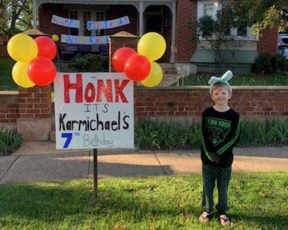 CELEBRATION: Karmichael Fosteris might have been in isolation for this 7th birthday, but he still celebrated in fine style. Photos: SUPPLIED