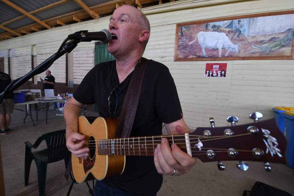 SNAPSHOT: Acoustic blues artist Matt Arthur entertained crowds at Sunday's Record, CD and Vintage Fair. Photo: CHRIS SEABROOK 030418crecord14