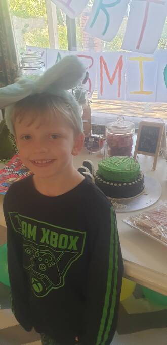 CELEBRATION: Karmichael Fosteris might have been in isolation for this 7th birthday, but he still celebrated in fine style. Photo: SUPPLIED