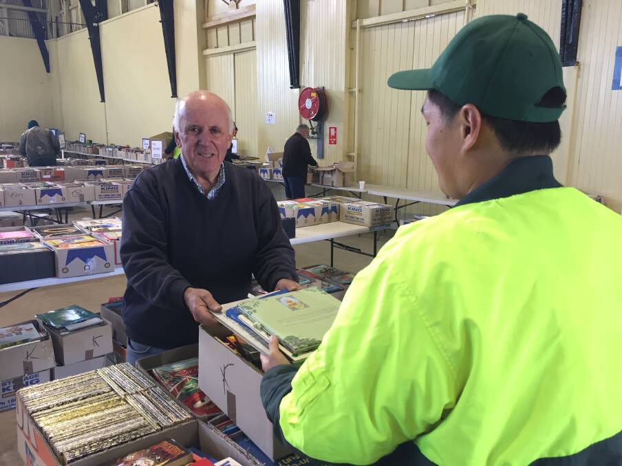 CALLING FOR SUPPORT: Lifeline Central West executive director Alex Ferguson said assistance from Bathurst Jail inmates is invaluable at each book fair. Photo: NADINE MORTON 051718nmbooks