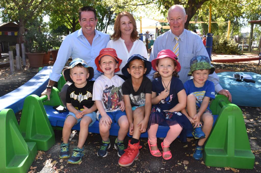 CHANGES: Bathurst MP Paul Toole, Scallywags' Leanne McCurry, Bathurst mayor Graeme Hanger with (front) Oscar, Tate, Isaac, Lucy and Hunter.