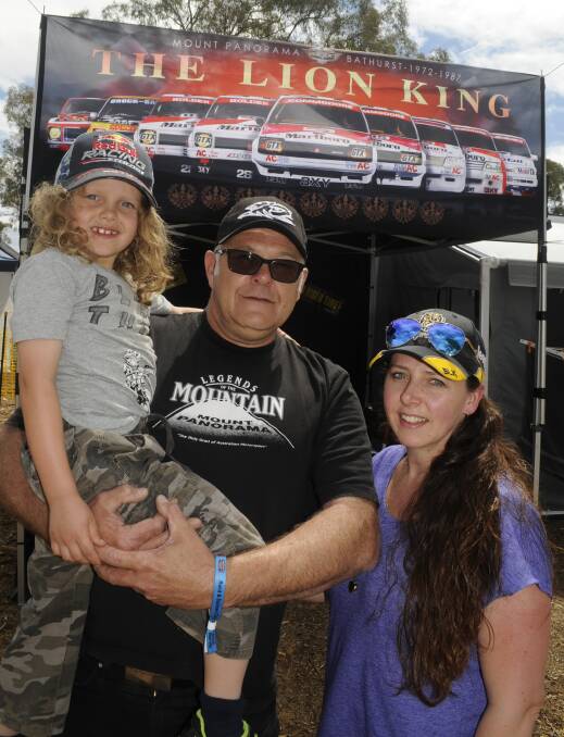 HOLDEN FANS: Scott and Kirsty Marnock with their son Max, 6.
