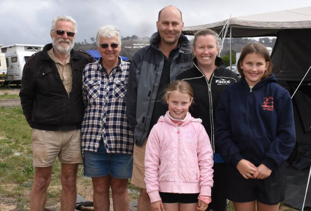 Three generations - Russ, Liz, Wayne, Cate, (front) Shae, 9, and Leah, 12, Driver are all first timers to the Bathurst 1000. Photo: NADINE MORTON 100819nmfaces4
